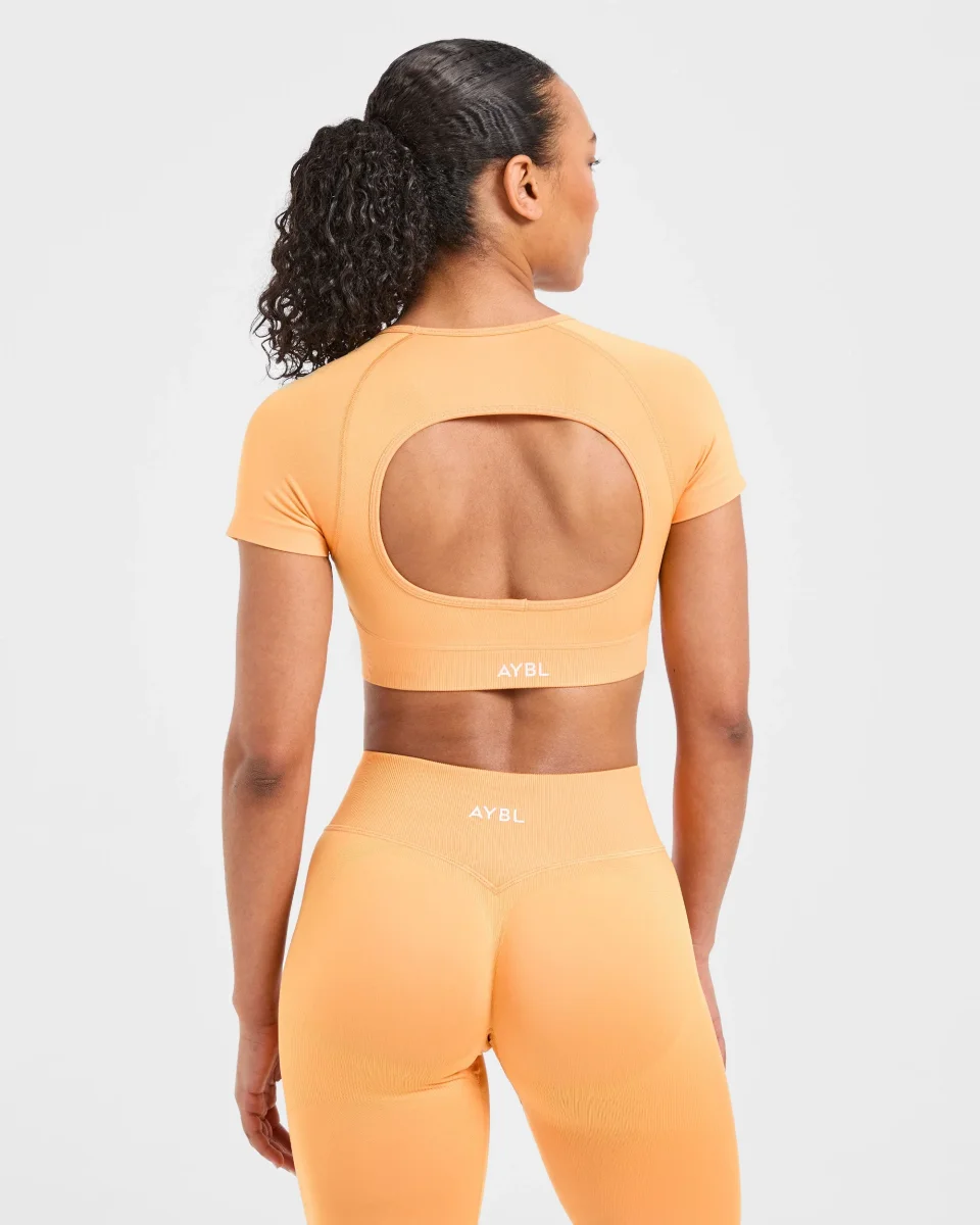 Adapt Seamless Crop Top - Bright Orange – Bild 3